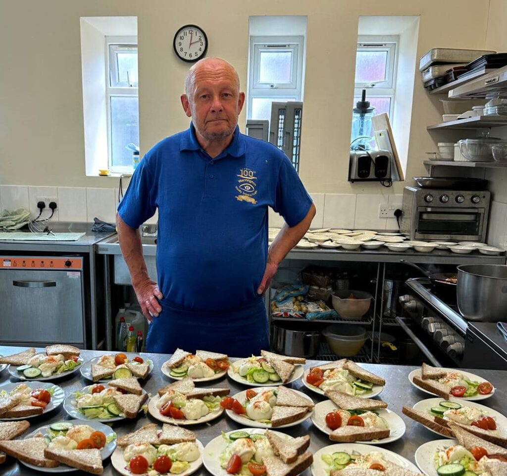 Chef Steve stood in the kitchen with his hands on his hips proudly showing his prepared starter